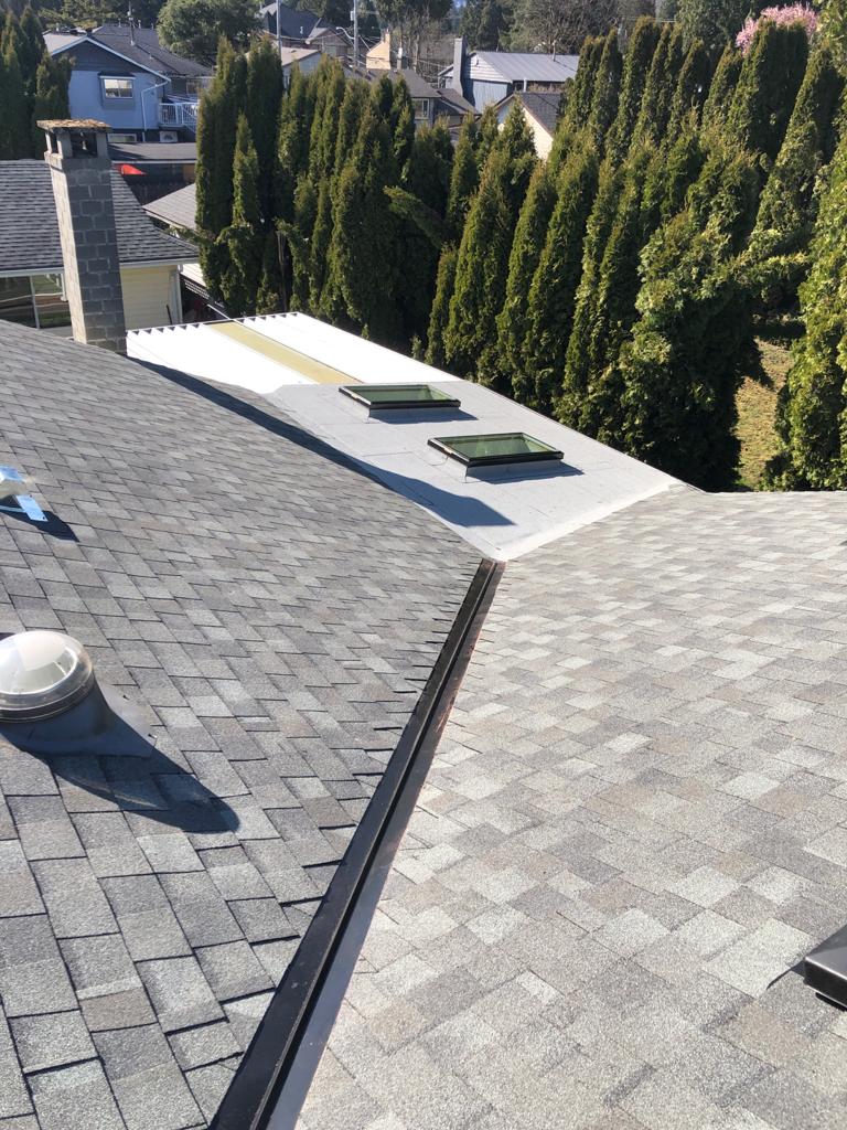 ew shingle roof system with 2 ply torch on membrane